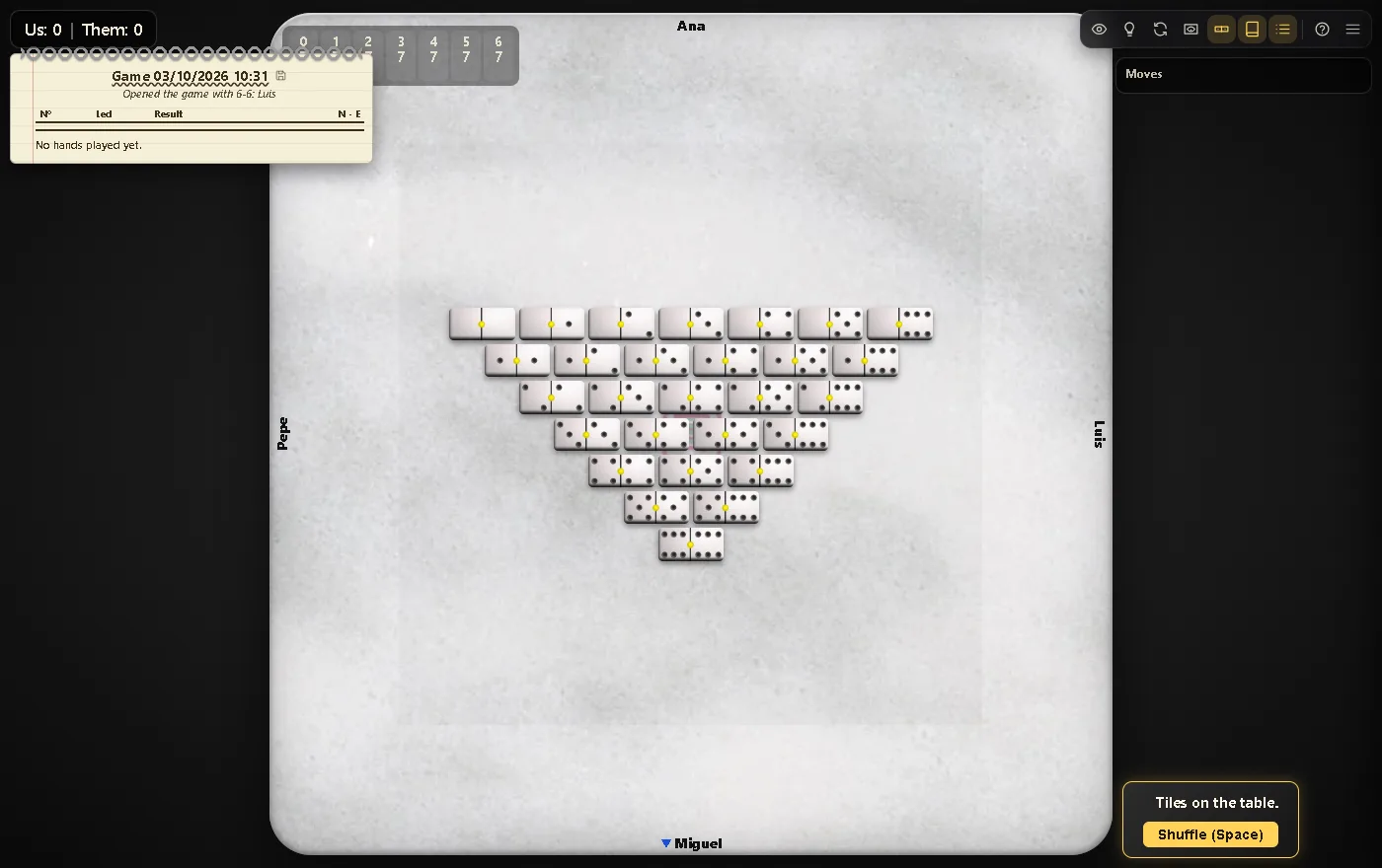 The 28 tiles face up on the table, ready to shuffle